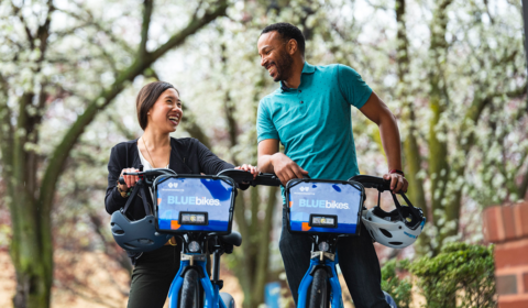 Image of a man and a woman on Blue Bikes